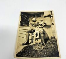 WWI Soldier in Uniform with Young Girl on Porch picture
