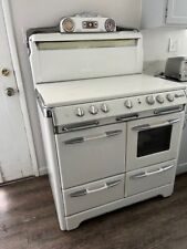 Vintage O'Keefe and Merit free standing stove white. All burners work. picture