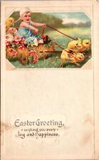 Easter Postcard Chick Pulling a Baby Toddler on Hay, Flower, Egg Covered Wagon picture
