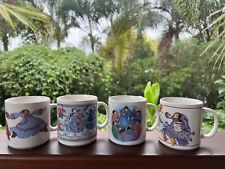 Four Barbra Lavallee Mugs picture