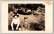 RPPC Postcard~ Young Woman & Young Soldier Sat On The Ground picture