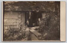 RPPC Two Dapper Gentlemen At Log Cabin With Wiskey Jug Real Photo Postcard P26 picture