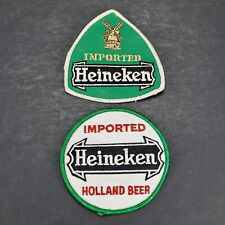 TWO VINTAGE IMPORTED HEINEKEN BEER EMBOIDERED CLOTH DISTRIBUTOR PATCHES picture