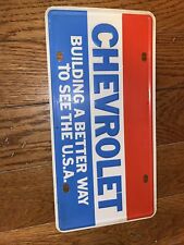Rare original Chevrolet license plate building a better way picture