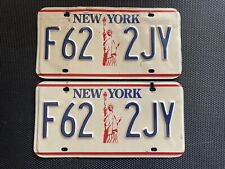 PAIR OF NEW YORK LICENSE PLATES STATUE OF LIBERTY F62 2JY picture