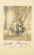 C-1910 Well Dressed Men with hats sitting in Swing RPPC Photo Postcard 21-10247 picture