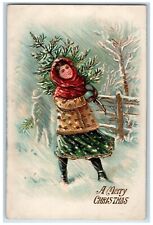 c1910's Christmas Girl Holding Christmas Tree Winter Snow Embossed Postcard picture