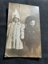 Antique 1904-1918 Divided Postcard of 2 Children Dressed In Winter Coats & Hats picture