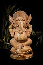 Handcrafted Wooden Four-Hand Ganesha Sitting Statue Sustainable Living picture