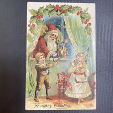 Christmas Embossed Santa Claus handing gifts A Merry Christmas Saxony No. 717 picture