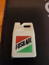 Vintage 1960-1970 Fusilade Oil Bottle Shaped Tape Measure picture