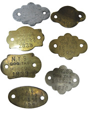 VINTAGE DOG LICENSE TAGS (7)  BRASS TYPE N.Y. 1928 1930 1933 1934 1935 1939 1946 picture