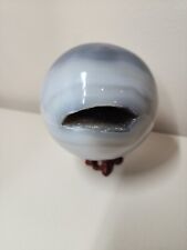 Large gray and blue agate sphere with black sugar druzy cave  picture