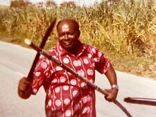 i4 Photograph Native Man Cutting Sugar Cane Roadside For Tourists 1980's picture