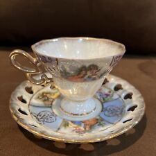 Vintage Lusterware Courting Couple Footed Teacup and Saucer. Made In Japan picture