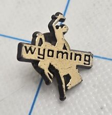 VTG Lapel Pinback Hat Pin Black Plastic Gold Lettering Wyoming Cowboy Pin picture