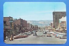 Postcard 1950s Main Street Grand Junction CO Cars Mesa Theatre Fort Dobbs V Mayo picture