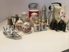 Assortment of Antique Salt and Pepper Shakers picture