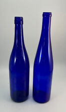 Cobalt blue bottles  wine alcohol vase lot of 2-12 in and 13 in t. no cork cap picture