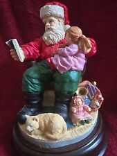 Musical Wind Up Santa Clause Figurine Reading To A Child picture