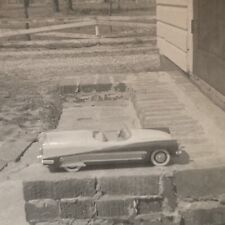 Vintage Snapshot Photograph Abstract Odd Toy Car On Front Step 1950s Nostalgia picture