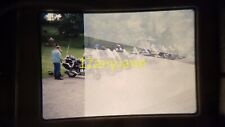 5103 vintage 35MM SLIDE photo LINE OF MOTORCYCLES PARKED WITH RIDERS STANDING picture