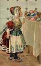 Easter Dutch Girl Looks at Decorated Eggs Misch & Co c1900s-10s Postcard picture