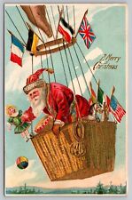Postcard Christmas Red Robe Santa Dropping Toys Hot Air Balloon Flags picture
