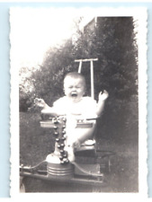 Vintage Photo 1940s, Baby Screaming/Crying on Antique Bouncer, Lawn , 3.5 x 2.5 picture