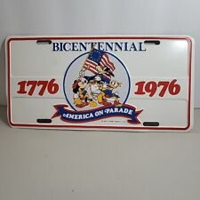 1976 DISNEY'S BICENTENNIAL AMERICA ON PARADE METAL LICENSE PLATE picture