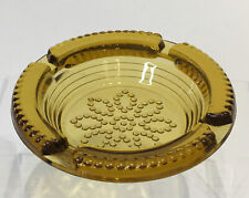 Vintage Amber 4.5 Inch Ash Tray With Flower Pattern Bottom picture