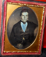 1/9th size Daguerreotype of younger man in half case picture