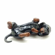 Black Dachshund Dog Lying on Back Ceramic Animal Figurine Statue picture