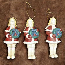 Vintage Ceramic Christmas Ornaments 3 Girls Red Coat holding a Green Wreath picture
