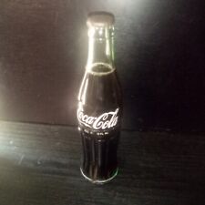 Coca-Cola  Full Unopened Bottle Green Glass Hobbleskirt Bottle 10oz  Columbus OH picture