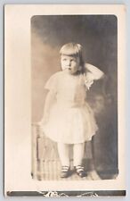 RPPC Child With Short Hair Dress and Sandals c1910 Real Photo Postcard picture