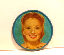 older pocket mirror showing blond woman on a blue field; made in Japan picture