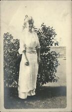 RPPC ~ young Edwardian woman in yard ~ real photo postcard picture