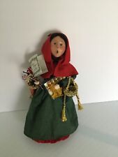 Buyers Choice Christmas Caroler vintage  2004. Presented on a stand   Colorful  picture