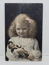 Vintage Postcard Little Girl Holding Doll Postmarked 1910 picture