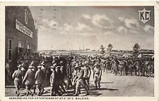 1919 MILITARY PHOTO POSTCARD: ASSEMBLING FOR ENTERTAINMENT AT K. OF C. BUILDING picture