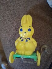 Vintage 1950’s Rod bro Plastics Yellow Easter Bunny Rabbit On Wheels picture