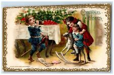 c1910's Christmas Wishes Boy Trumpet Rocking Horse John Winsch Signed Postcard picture
