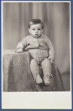 Beautiful child in a knit suit on a chair, cute baby Soviet Vintage Photo USSR picture