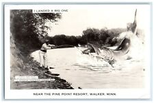 Man Cached Exaggerated Fish Near Point Resort Walker MN RPPC Photo Postcard picture
