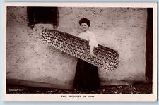 Moscow IA Postcard RPPC Photo Woman Carried Exaggerated Corn Two Products Iowa picture