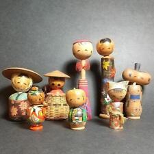 8 Different Kokeshi Dolls picture
