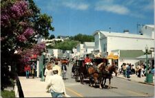 Mackinac Island MI Michigan Main Street Horse Drawn Carriages Vintage Postcard picture