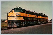 ONTARIO NORTHLAND 1500 PAIR OF FP7-A's AT COCHRANE LOCOMOTIVE TRAIN POSTCARD picture