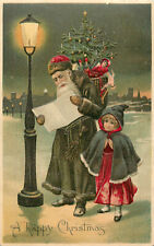 Embossed Christmas Postcard Green Dark Green Robe Santa Claus Read Map Lamplight picture